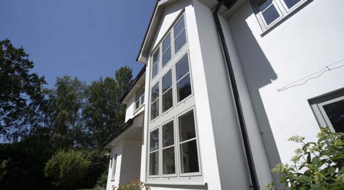 Agate Grey Fascia & Soffits and Black Square Guttering Modernise White Rendered Detached Property, Oxshott