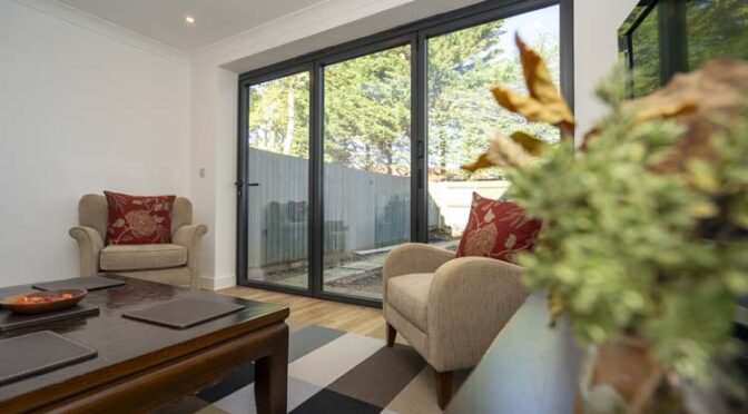 Minimalistic Flat Rooflight and Anthracite Grey Bifolds for Rear Extension of Terraced House, Ascot in Berkshire